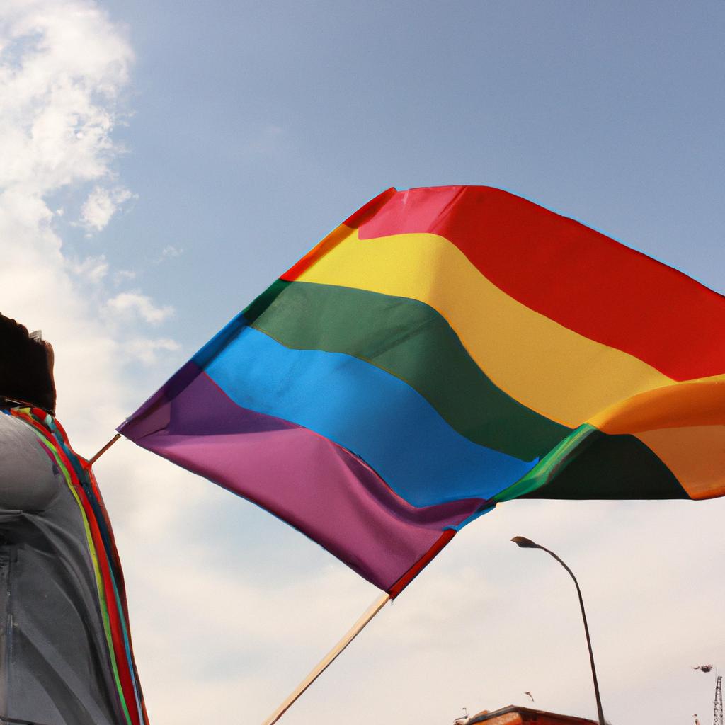 Person holding rainbow flag, protesting